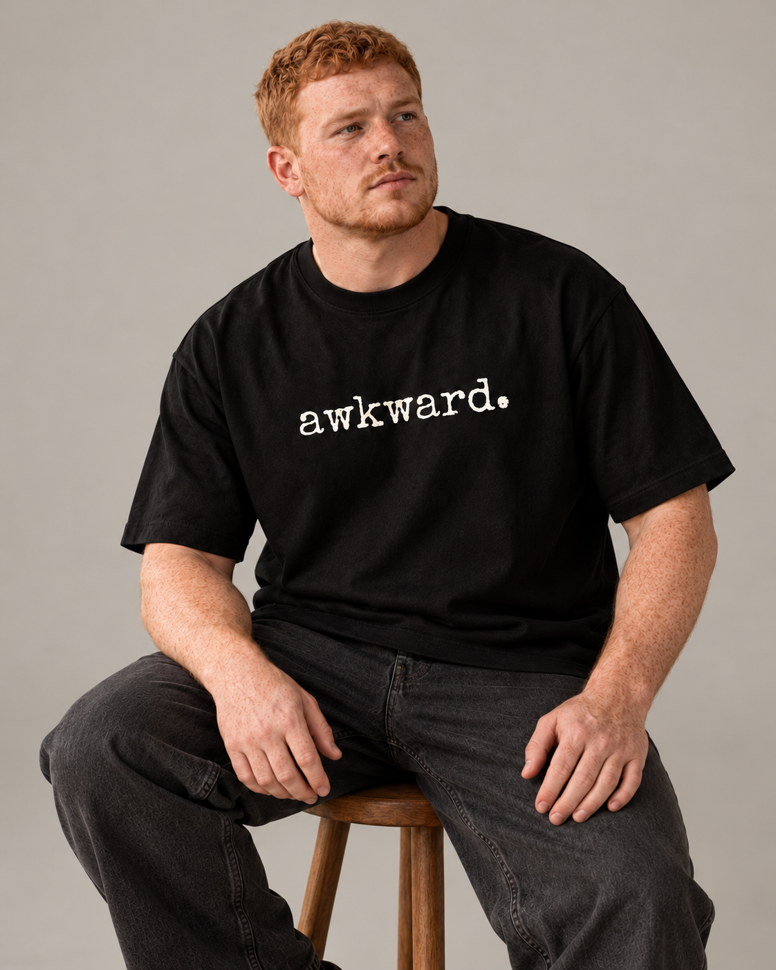 awkward. black Wear Adj heavyweight tee front digital styling mockup — not a physical sample